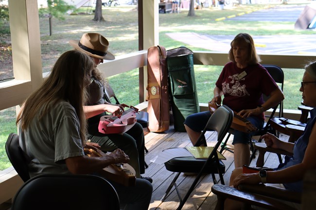 A group setting around for a Dulcimer Lesson
