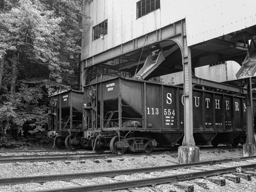 black and white photo of a train