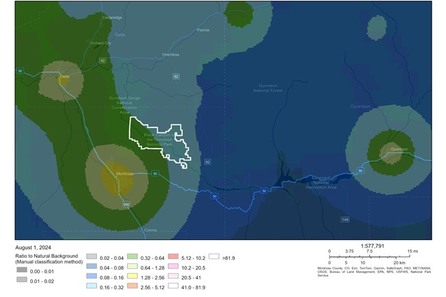 A map with blue and green shades showing sky light pollution ratios. The park is outlined in white.