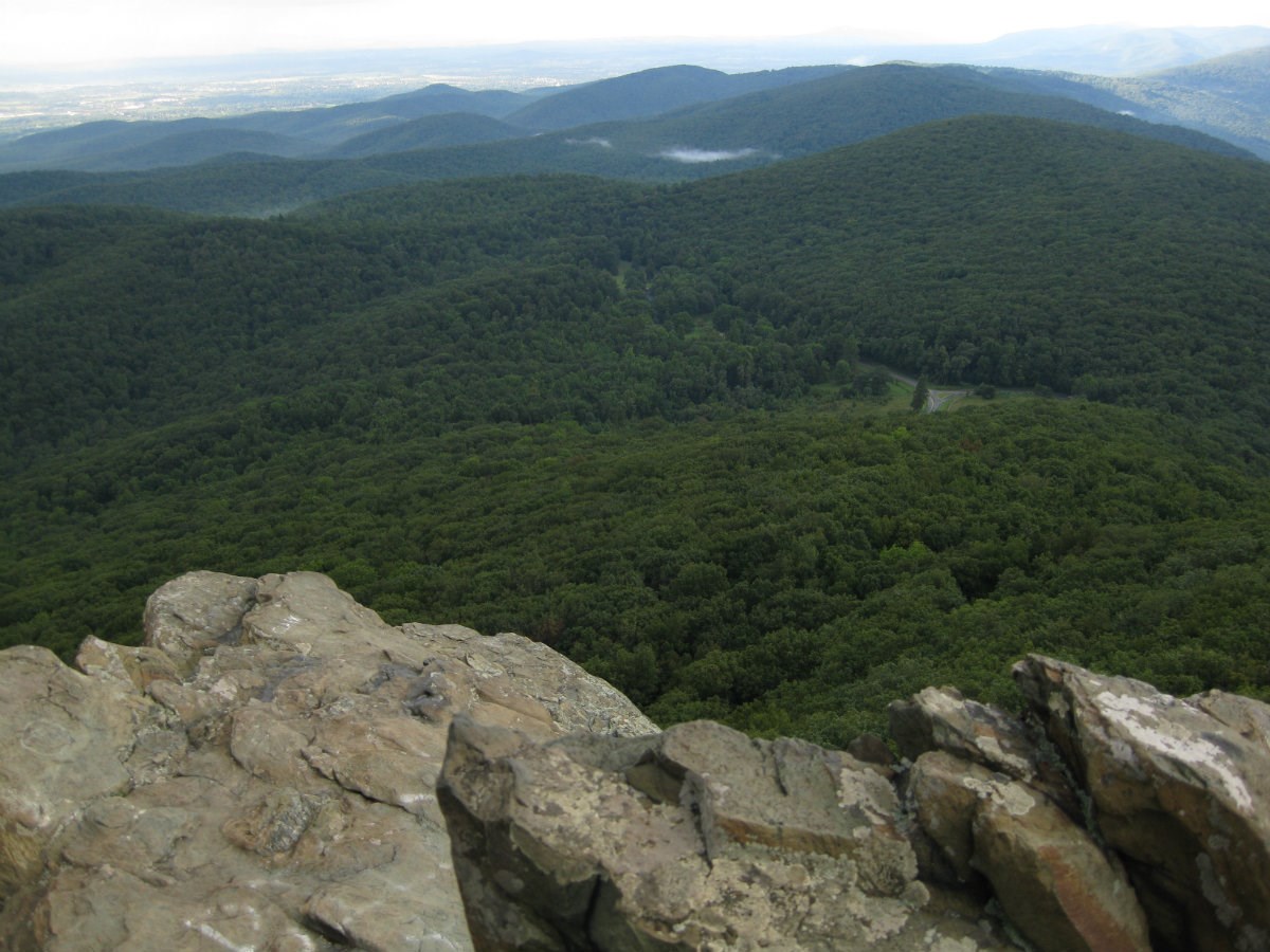 Sweeping view of green hills below from Humpback Rocks