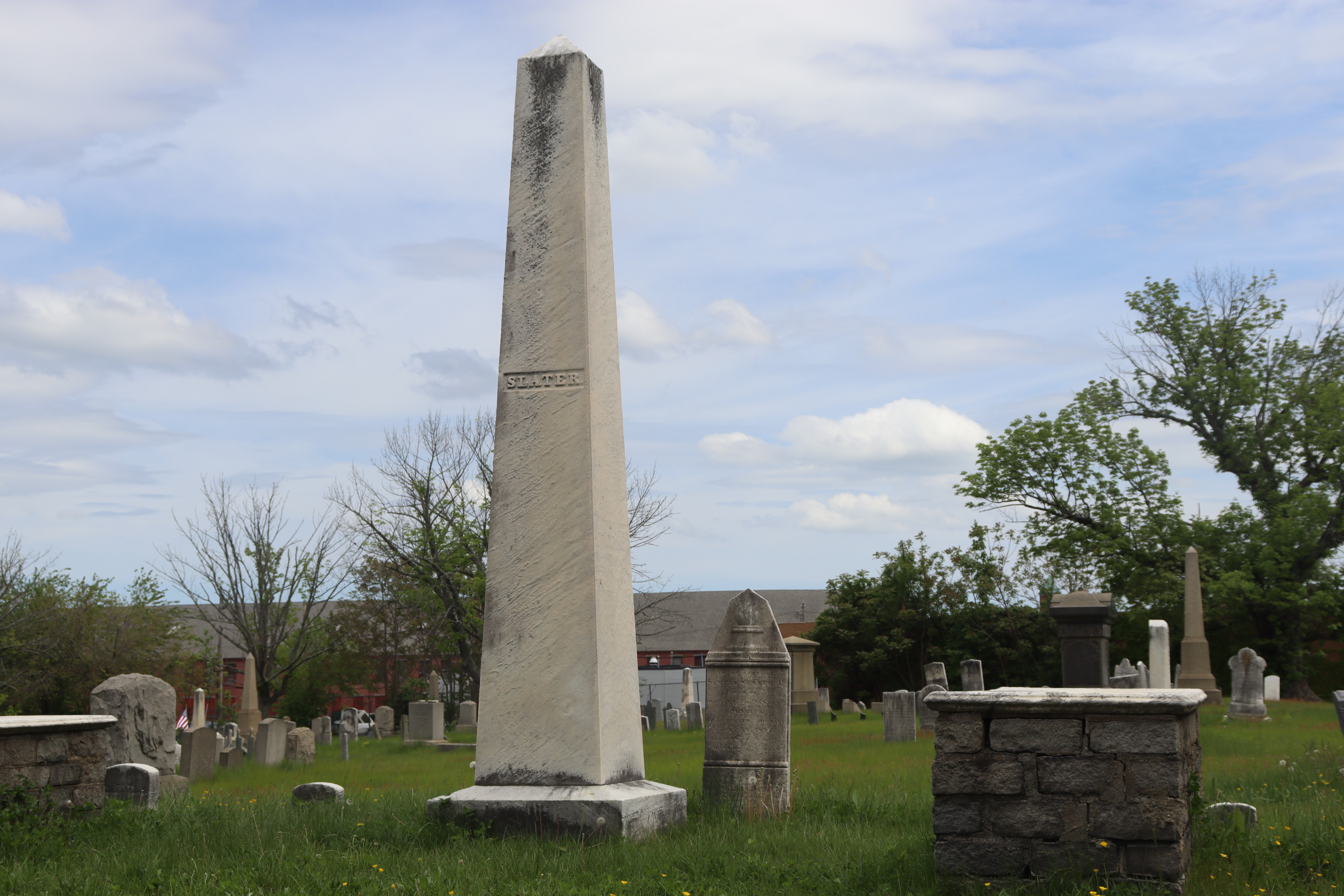 White obelisk with "Slater" on the side of it