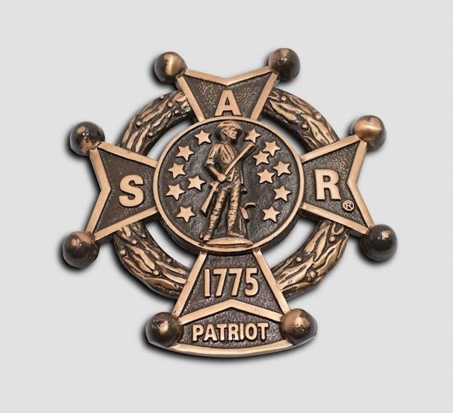 a grave marker indicating service in the american revolution