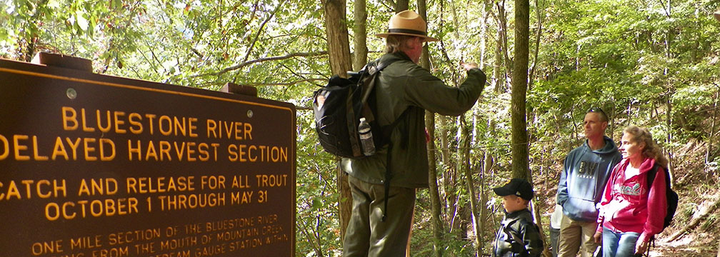 ranger talking to visitors