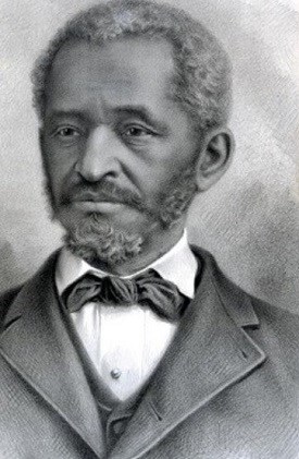 Portrait of african american man with short cropped hair and short facial hair.