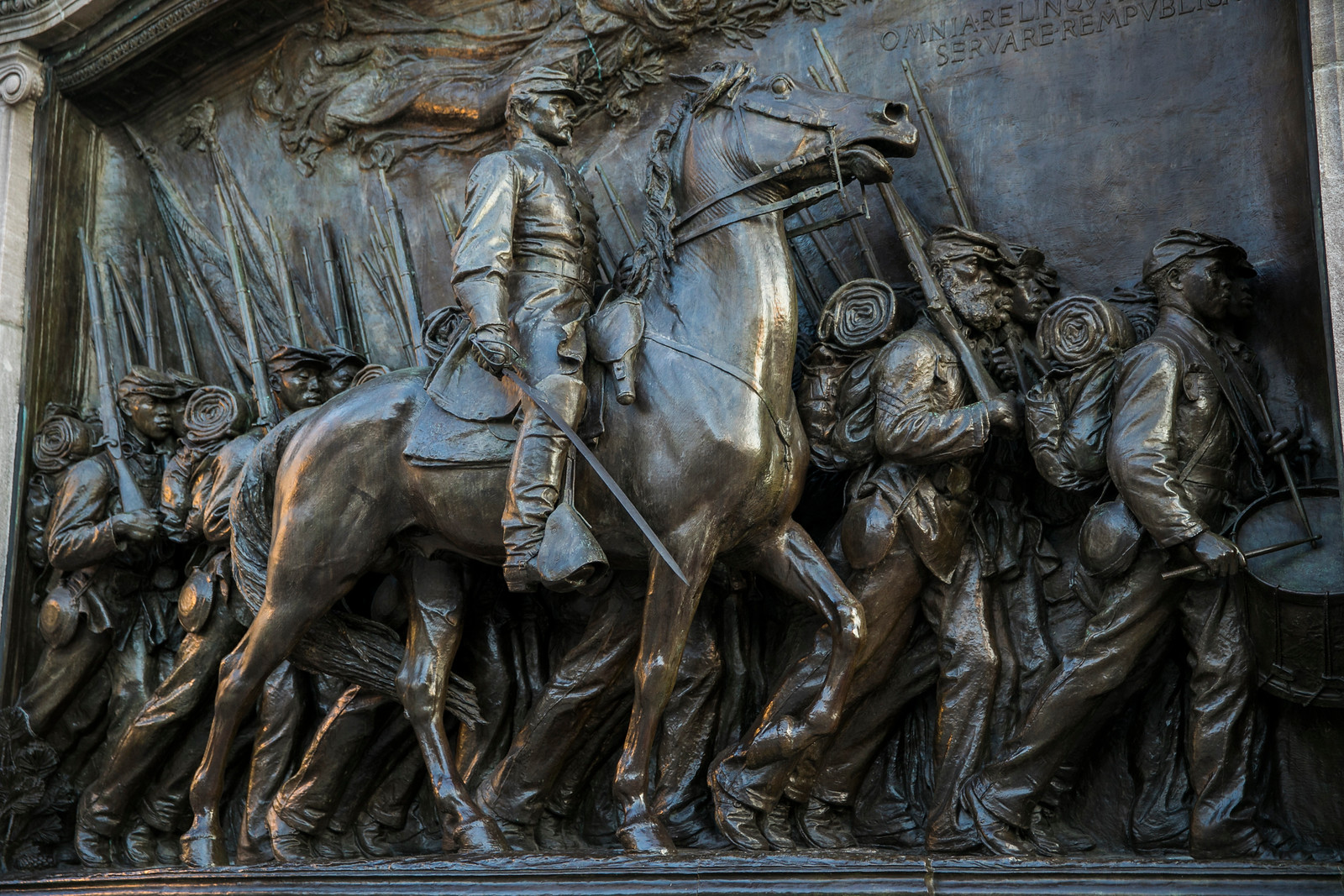 close up of Shaw 54th memorial on RGS on horseback and soldiers marching