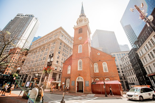 a brick building with a single steeple