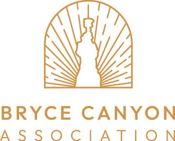 A design that looks like the sun behind the Thor's Hammer rock formation with text that reads "Bryce Canyon Association"