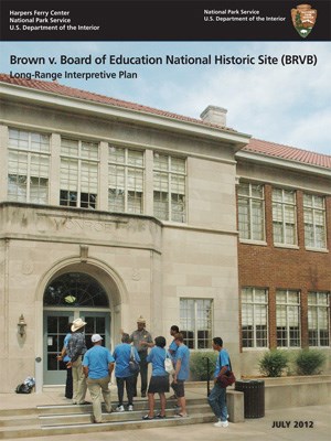 Cover of the long-range interpretive plan, featuring an image of visitors listening to a park ranger's presentation in front of the site.