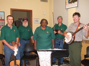 Ron Parker, Norton Canfield, Willie Faye Smith, Ken Ruhnke, and Dave Schafer provide music of the parks at the artwalk.