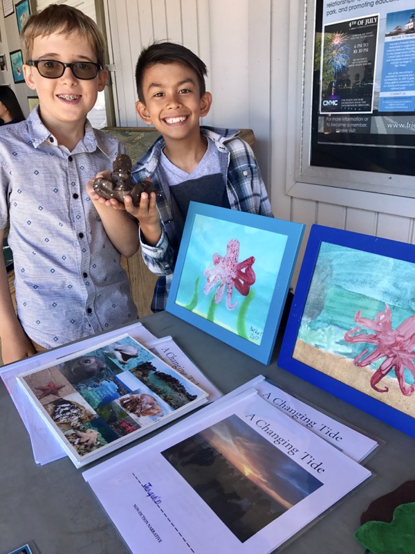 High Tech Elementary students showing their 3d tidepool critter models High Tech Elementary students showing their 3d tidepool critter models