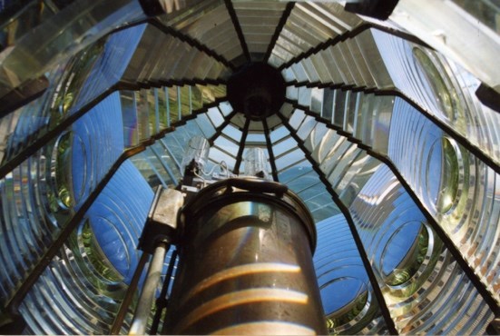 A flash lense and a glass ceiling.