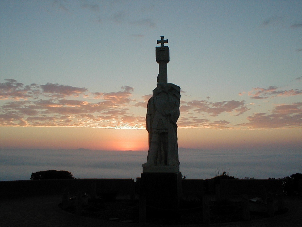 Sunrise behind Cabrillo statue