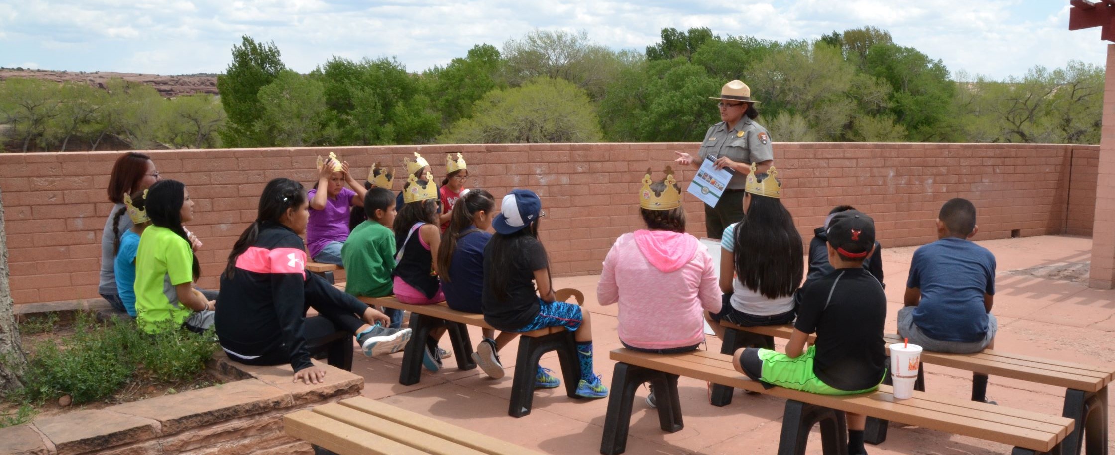 Park Ranger talking with group of young students