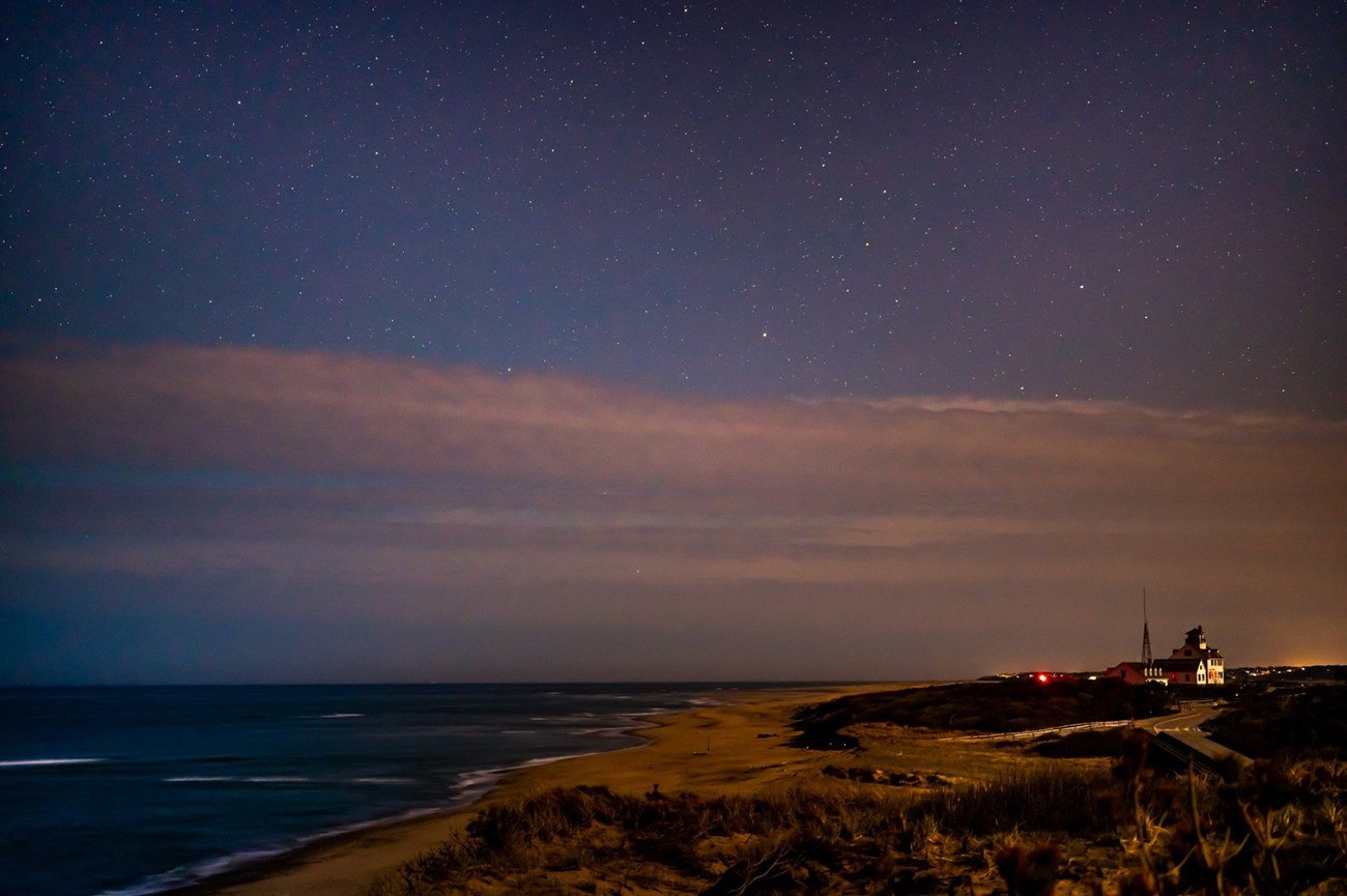 Image of the stars and night sky over Coast Guard Station in Eastham.