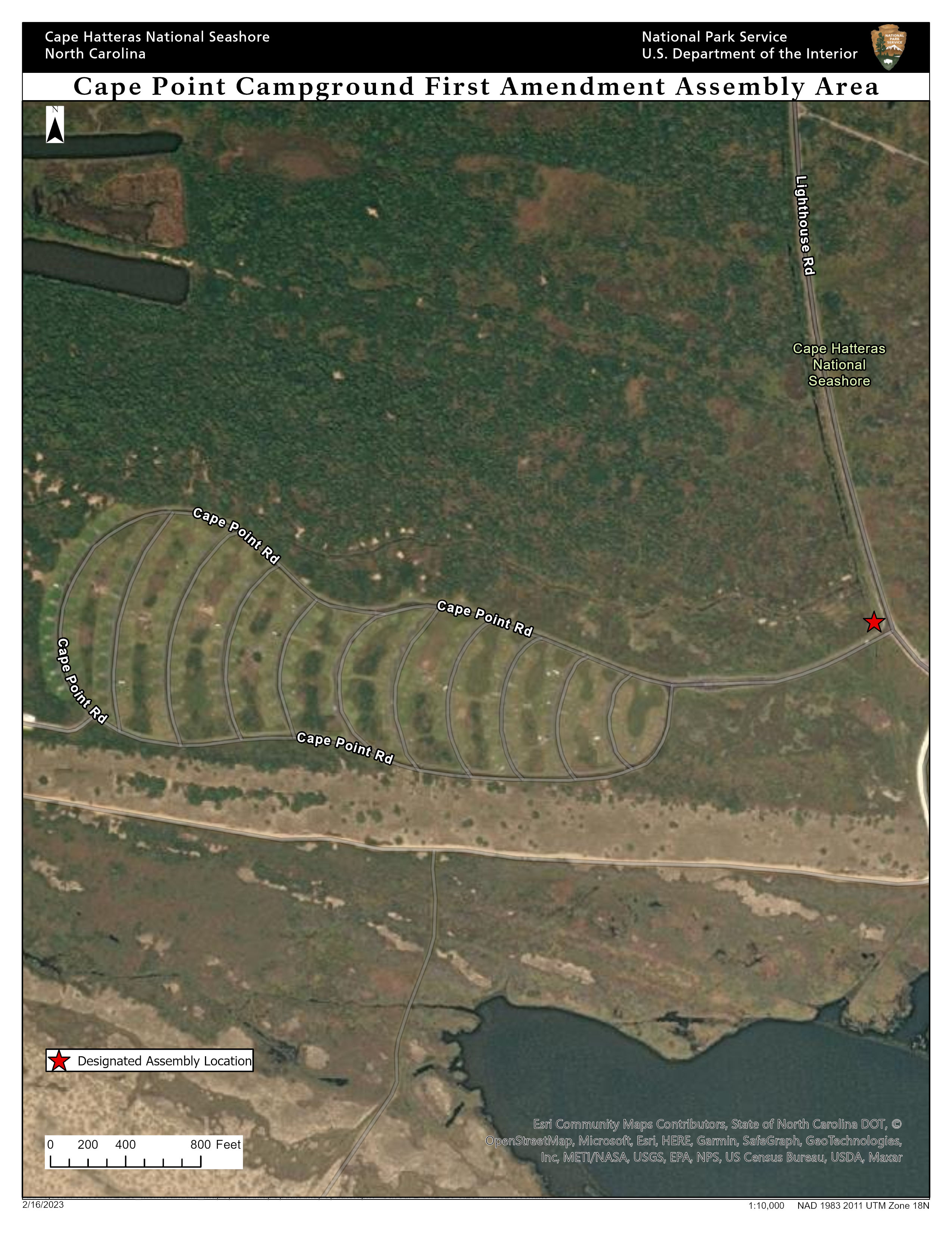 The designated assembly location lies at the junction of Lighthouse Road (west side of the road) and Cape Point Campground Perimeter Loop Road (north side of the road).