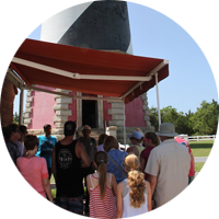 Visitors talking with a ranger before climbing Cape Hatteras Lighthouse