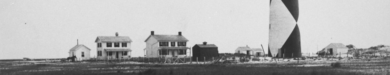 The other buildings of the Cape Lookout Light Station clustered around the base of the lighthouse.