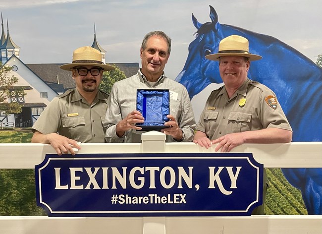 Volunteer-in-Park Wayne B. accepting a service award from the Lexington Hospitality Awards, May 2025.