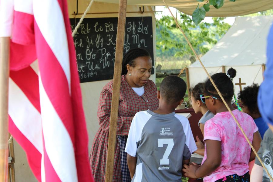 National Park Service volunteer portraying a teacher during the Civil War.