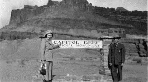 Harriett and Charles Keely stand by the old park entrance sign