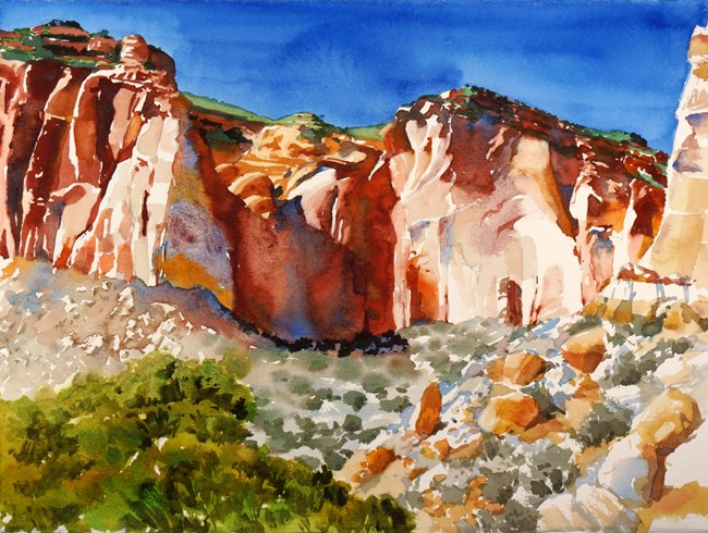 Colorful watercolor painting of red cliffs, blue sky, green vegetation, and tan rocks.