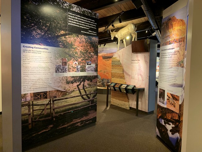 Three exhibits on history and geology. Scenic background images with text and interactives.