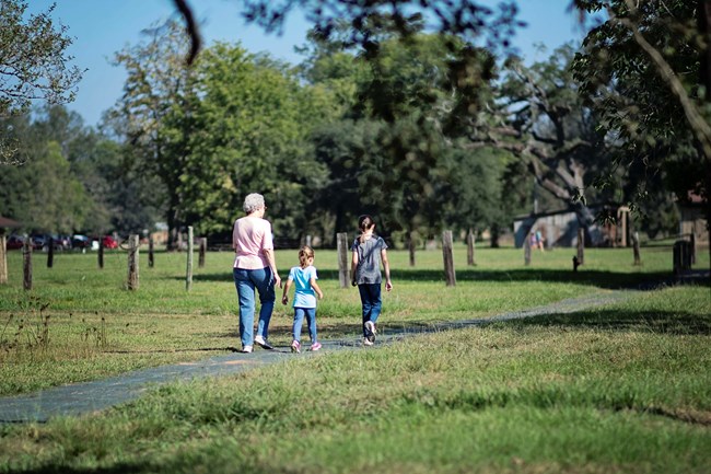 Visitors walking on the trail at Oakland.