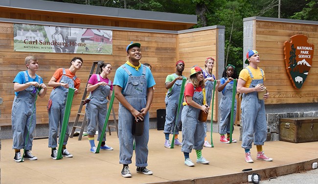 Actors performing Sandburg's works on stage