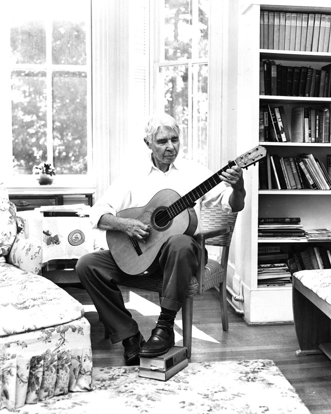 CARL 2673 Sandburg with Guitar in Bedroom 5-22-52 by June Glenn, Jr
