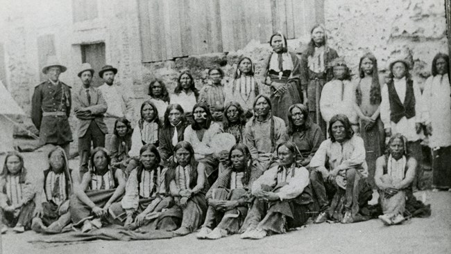 Kiowa prisoners in traditional dress.