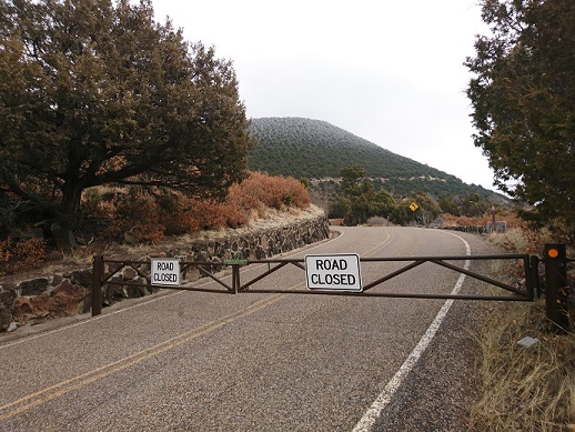 Gates across Volcano Road with Capulin Volcano in the background