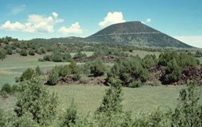 color photograph of Capulin Volcano at greenup in the spring.