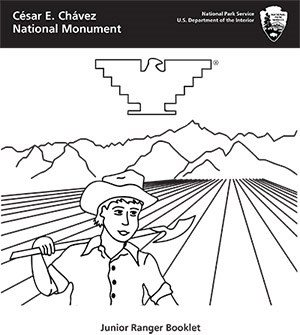 The cover of the junior ranger activity book showing a drawing of a man walking through fields