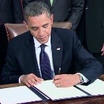 President Obama signs the Presidential Proclamation.