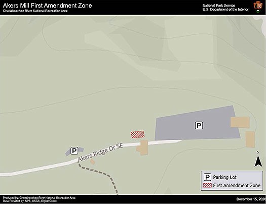 First Amendment Zone is to the left of the access road before large parking lot.