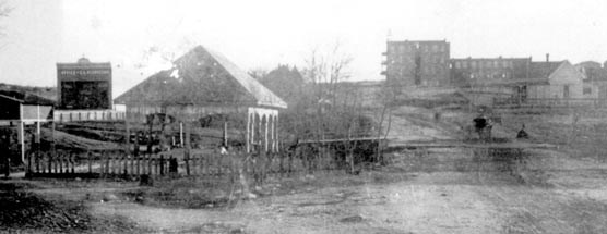 Historic photo of mineral spring and buildings