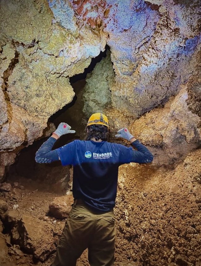 intern showing back of shirt