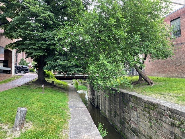 Lock 2 in the foreground and the 29th St Bridge over the canal.