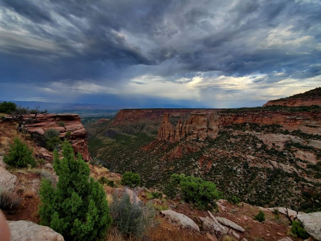 A view of storm clouds over a canyon
