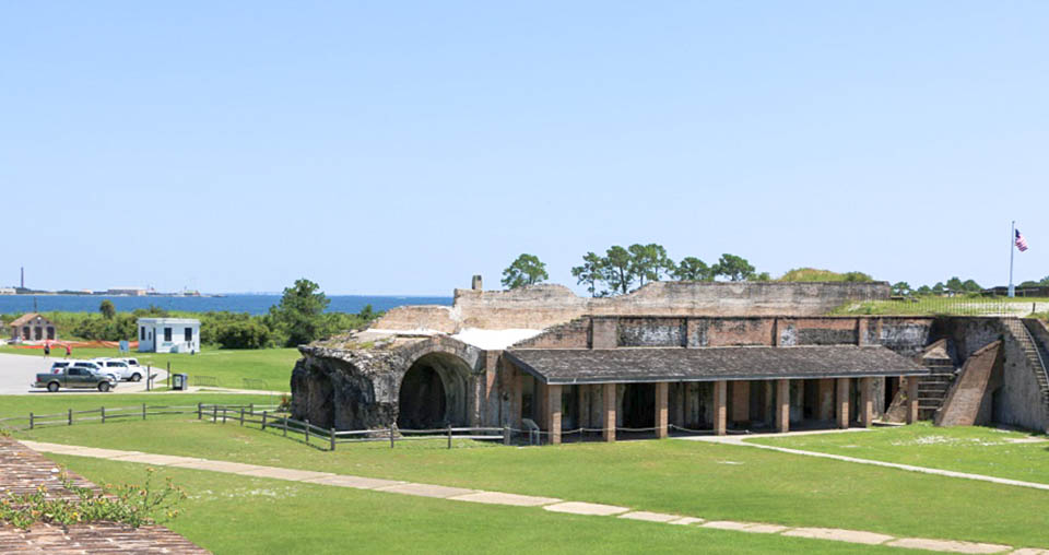 Fort Pickens Then: Cars parked on parade ground near Bastion D (ca. 1950s)