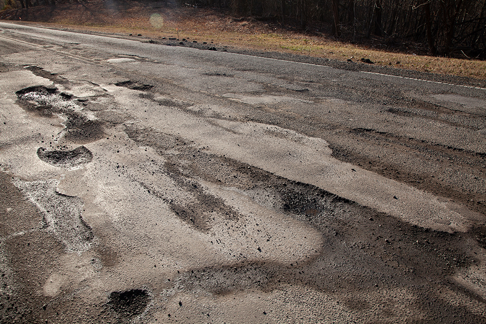 holes in blacktop on fort davis drive