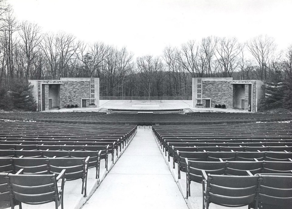Black and white photo of a stage and seating area