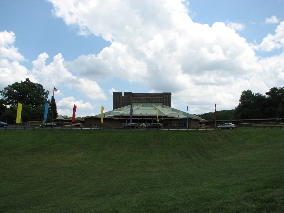 Meadow turf area with Filene Center in the background