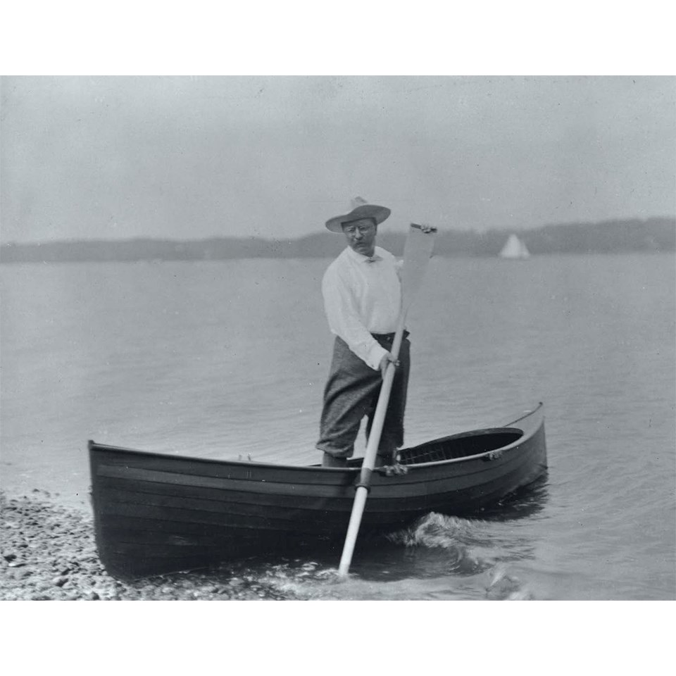 Theodore Roosevelt in a boat on Cold Spring Harbor Shore