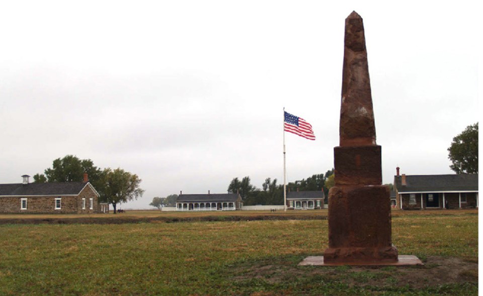 Brown stone mark, tall and pointed.