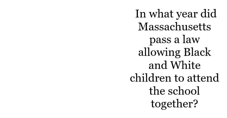 The Phillips School is a four story red brick building with a small tower or cupola on top.