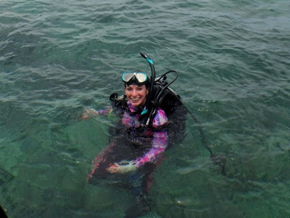 Abbie Johnson in military uniform near the ocean