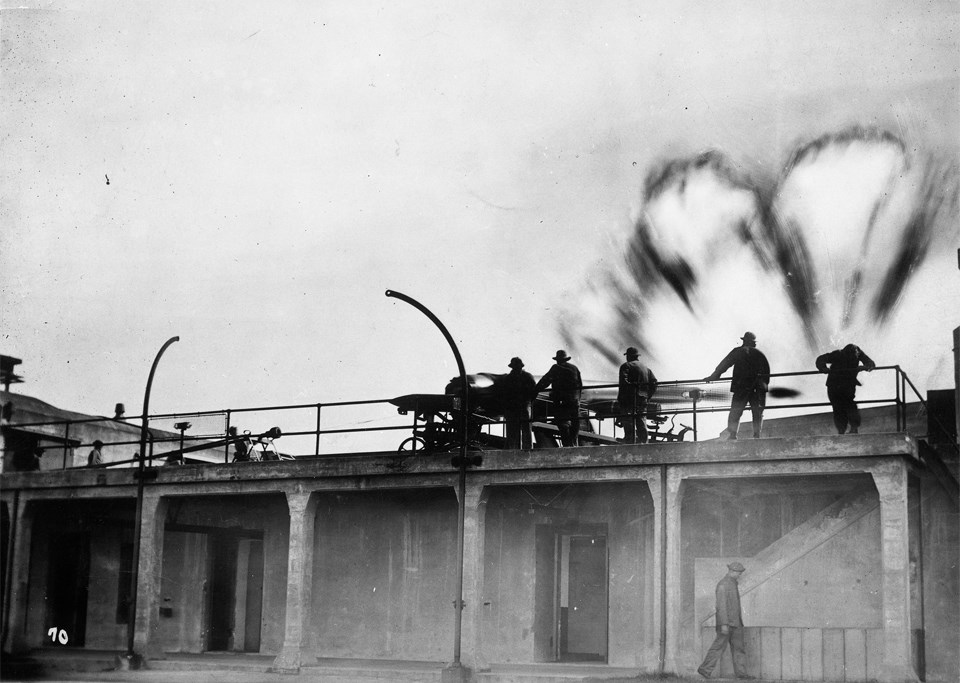 soldiers on railing with smoke