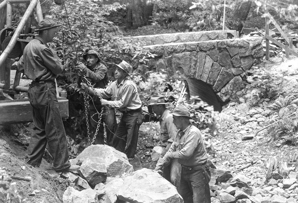 men building a bridge