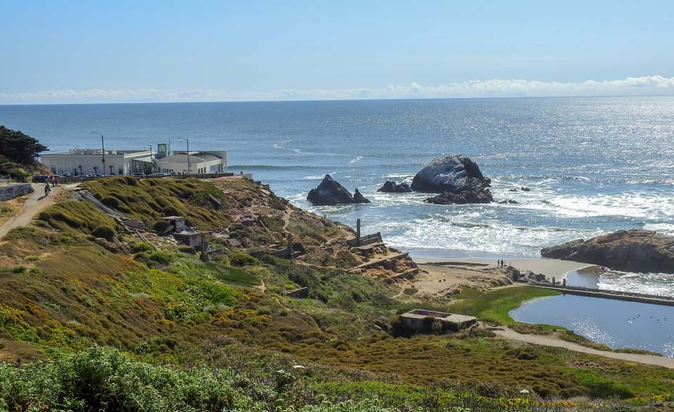a house on a grassy hill